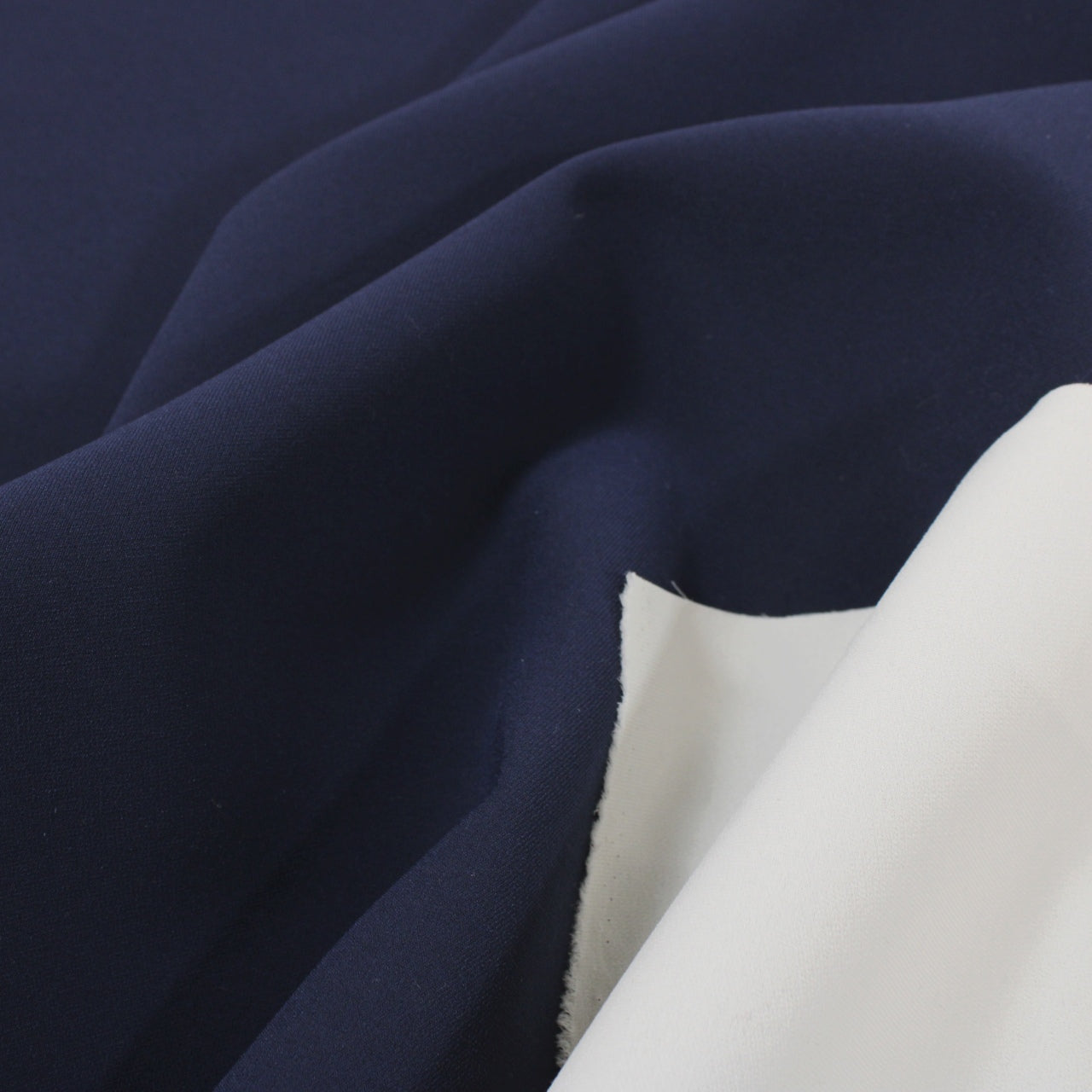EGGSHELL AND NAVY DOUBLE-FACED WEAVE