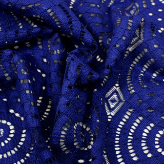 close-up of indigo colored lace fabric