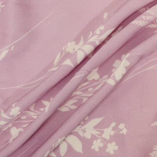 three draping lines of floral patterned crepe back satin in light purple and white