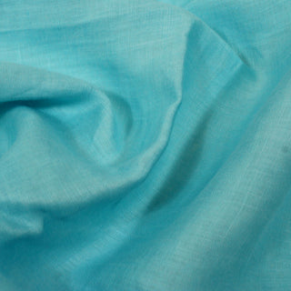 close-up of slub plainwoven teal fabric