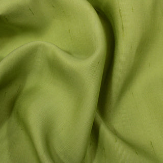 close-up of chartreuse colored shantung silk fabric, detailing its ribweave and subtle slubs