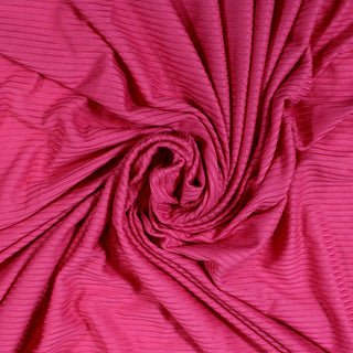 swirl of a hot pink rib knit jersey fabric