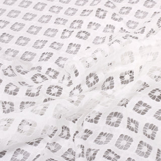 close-up of diamond patterned white lace fabric