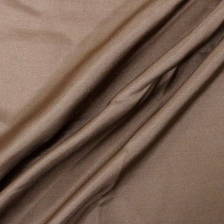 three draped diagonal lines of bronze colored silk mikado fabric, demonstrating its lightweight hand and subtle sheen