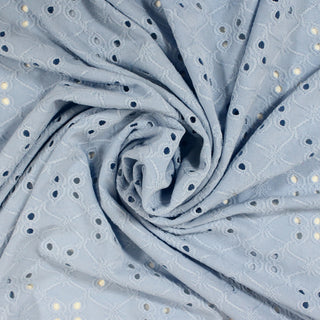 swirl of baby blue colored knit eyelet jersey fabric
