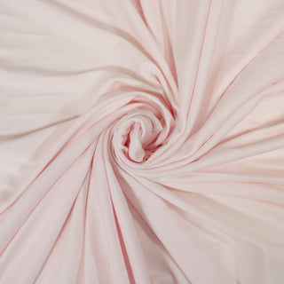 swirl of jersey knit fabric in ballerina pink