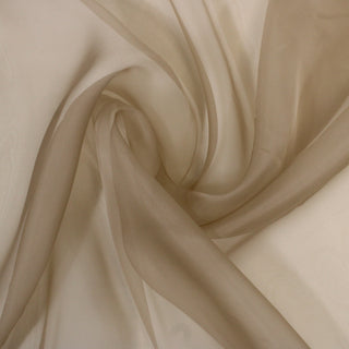 swirl of beige colored silk organza fabric