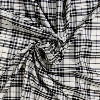 swirl of lightweight black and white silk taffeta fabric