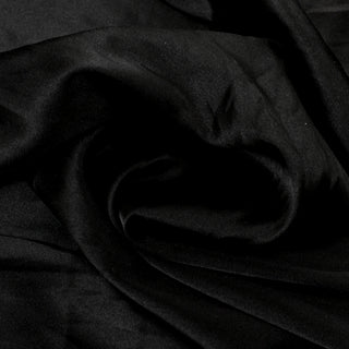 close-up of a black silk charmeuse fabric