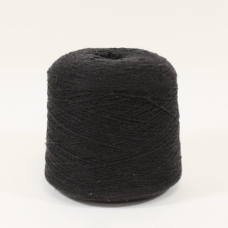 cone of black yarn in a fine-gauge with small slubs throughout