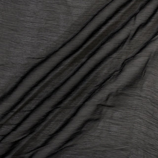 black crinkle chiffon fabric with three diagonal lines across it to show the lightweight drape and crinkle texture