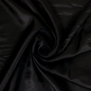 swirl of black cupro fabric