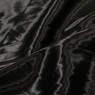 close-up of black flannel-backed charmeuse fabric
