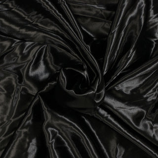 swirl of black charmeuse fabric