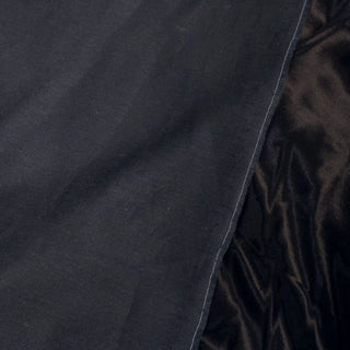 front and back view of black charcoal-flannel-backed charmeuse fabric