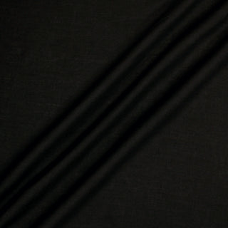 rippled black rayon fabric, showing its structured drape