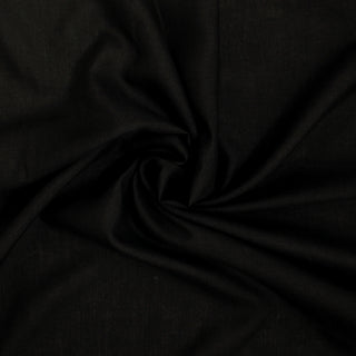 swirl of stiff black plainweave rayon fabric
