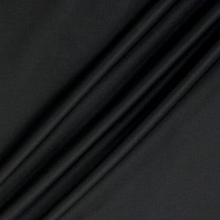 black satin fabric with three diagonal lines arranged across it to demonstrate the structured hand and subtle surface shine
