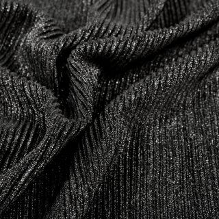 close-up of black sparkle stretch fabric, detailing the lurex dots