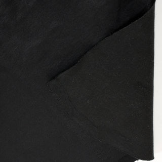 front and back of black stretch-backed leatherhide