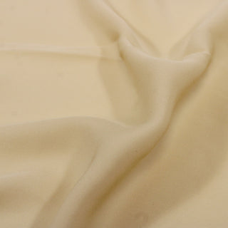 close-up of blonde colored silk chiffon fabric, detailing the matte face and weave structure