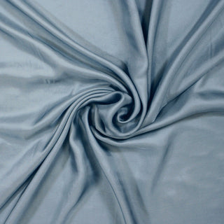 swirl of bluebell colored silk mikado fabric