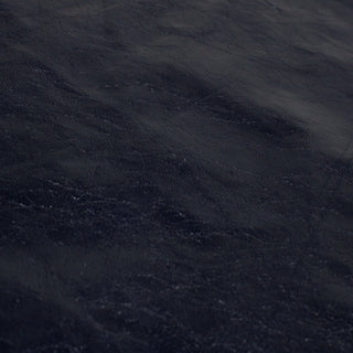 face of a blue glossy lambskin leather hide with a slight crinkle texture and clear surface shine