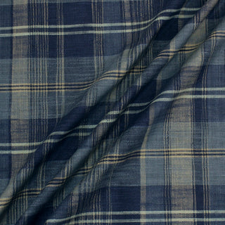 blue multicolor cotton woven plaid fabric with slub texture throughout, arranged into three diagonal lines across the surface to show the textural face and drape