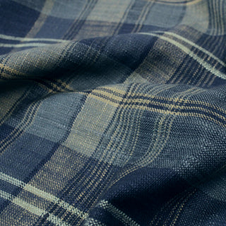 close-up of blue plaid fabric with slub texture
