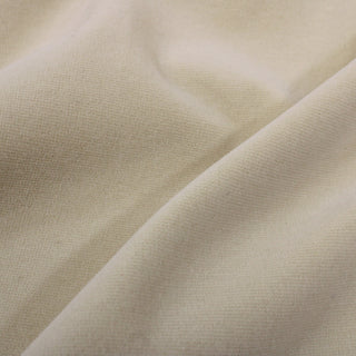 close-up of bone colored velveteen fabric, detailing its fuzzy face