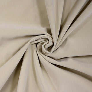 swirl of bone colored velveteen fabric