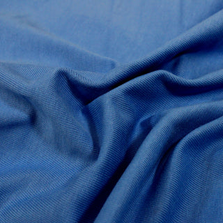 close-up of a bright blue knit jersey fabric