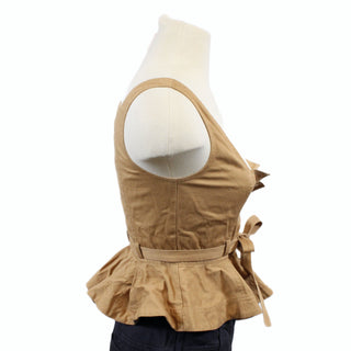 side view of a brown button-up top showing the peplum silhouette