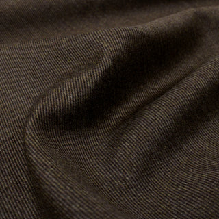 close-up of a brown cavalry twill fabric, detailing the weave and draping capabilities