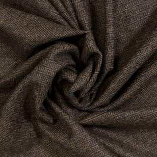 swirl of brown wool herringbone suiting fabric