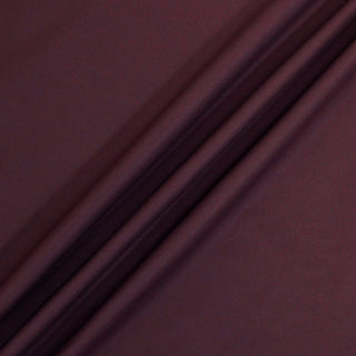 ripple of burgundy color gabardine fabric