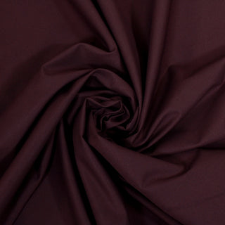 swirl of burgundy gabardine fabric