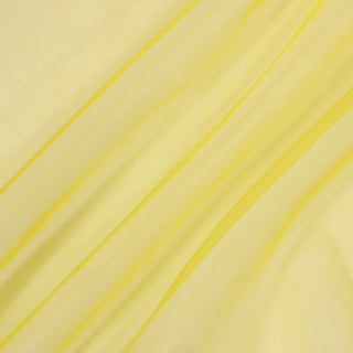 diagonal lines draped of a buttercup yellow silk organza fabric, showing its structured drape and sheer quality