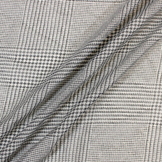 three diagonal lines draped of a black and white printed silk chiffon
