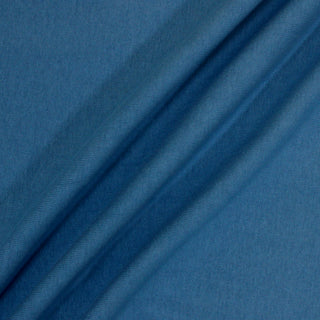 three diagonal lines draped of a cerulean blue 1x1 rib knit jersey fabric 