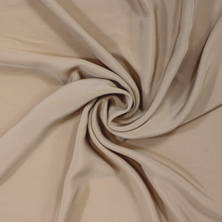 swirl of champagne colored marocaine fabric