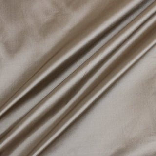 three diagonal lines of champagne colored silk taffeta fabric