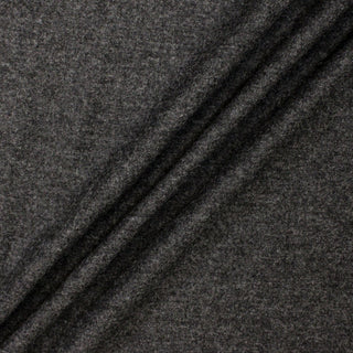 rumpled charcoal wool tweed fabric showcasing hand of fabric