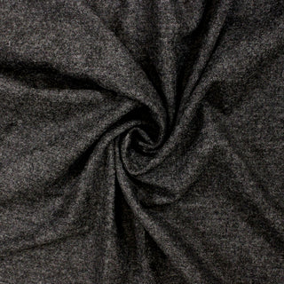 swirl of charcoal grey wool tweed fabric showing drape