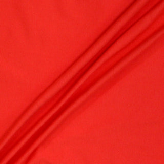 three diagonal lines draped of a chili red colored jersey fabric
