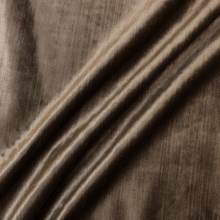 three diagonal lines draped of a chocolate truffle brown colored velveteen upholstery fabric with subtle textural lines running throughout the pile