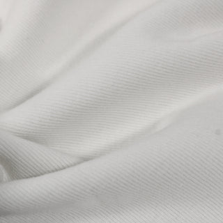 close-up of a cloud white colored 1x1 rib knit jersey fabric, detailing its knit structure