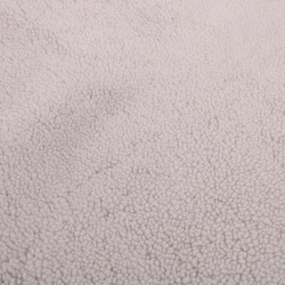 face of coconut shearling hide, short and curly pile