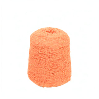 Large coral fine-weight slub yarn cone on a white background.