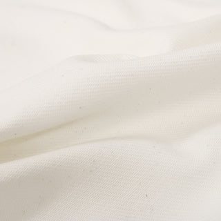 close-up of cotton twill fabric, showing the weave and hand